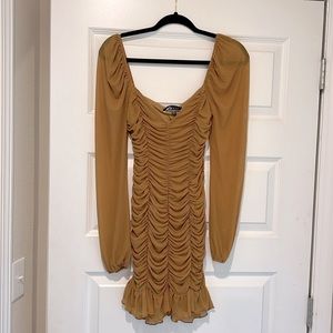 Blue Blush ruched mini dress. Color is a mustard yellow. Size Small. Worn once.